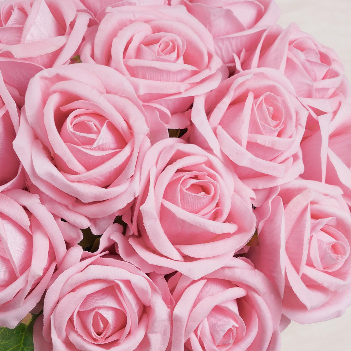BLEUM CADE pink roses on sturdy stems ideal for vase displays.