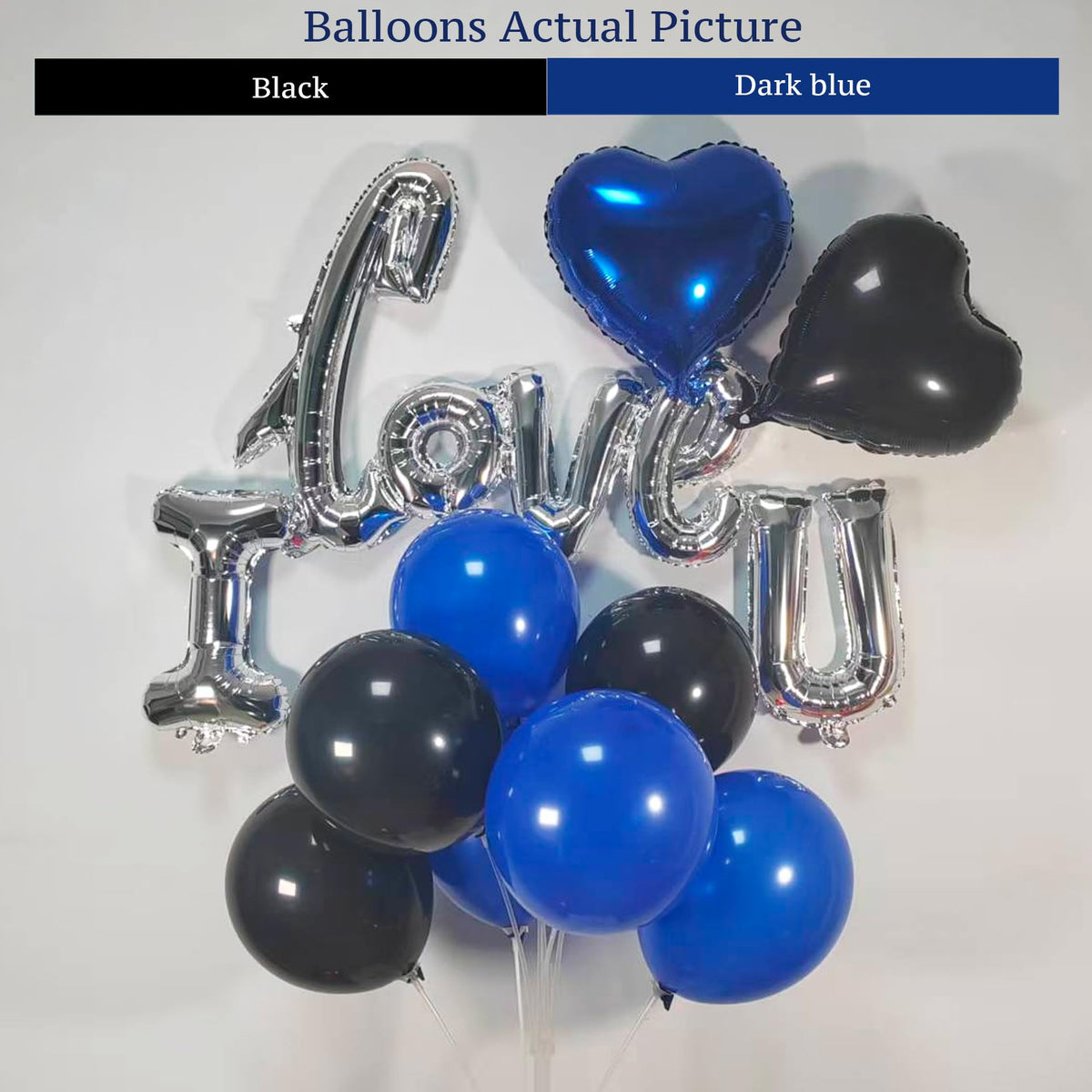 BlissBash silver I LOVE YOU letters add a modern touch to hotel room decor.