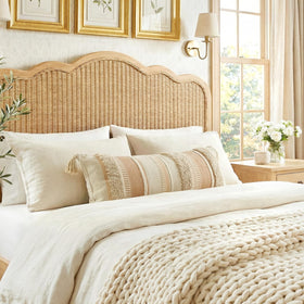 Layered BlissBlush cover creates a polished bed arrangement with lumbar support.