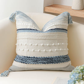 BlissBlush coastal blue boho cover 20x20 on sofa with warm texture