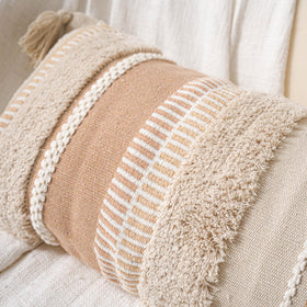 Beige woven pattern anchors bedding with calm, versatile styling.