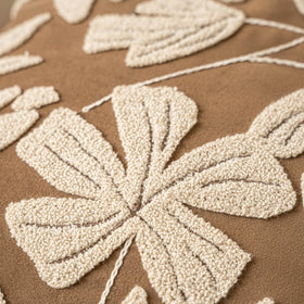 Tufted detailing adds texture and visual depth.