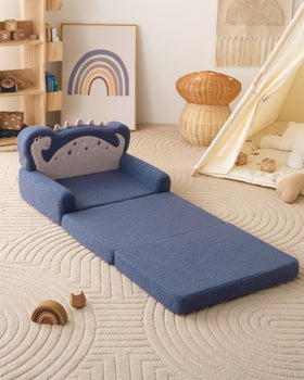 Blue dinosaur play couch suits playrooms and travel-friendly seating.