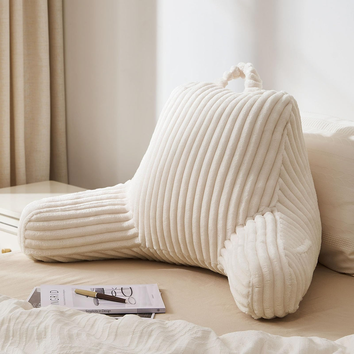 Blissful Diary Reading Pillow backrest shows extended arm support for comfort.