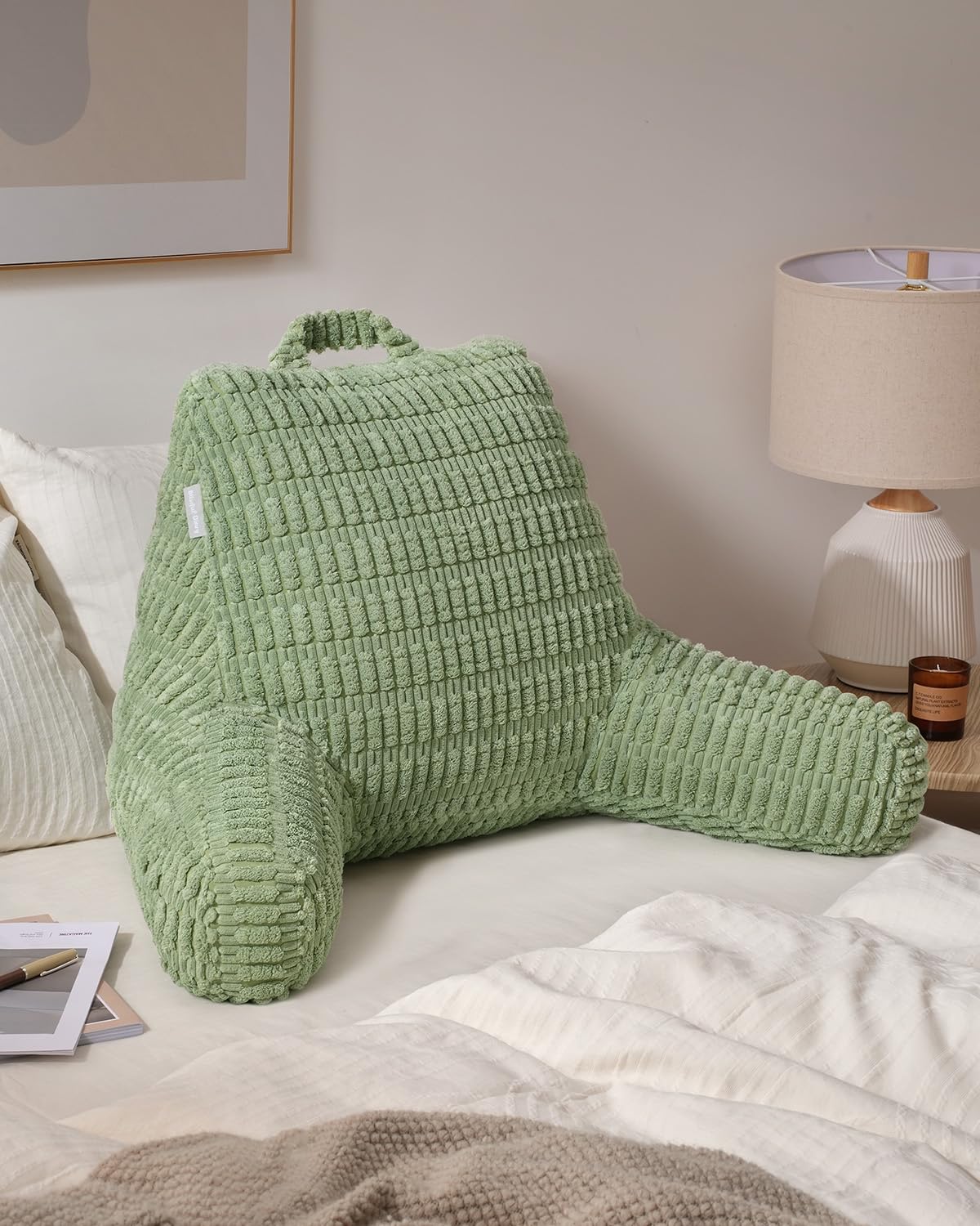 Blissful Diary pillow on couch illustrates ideal sit-up posture while watching TV