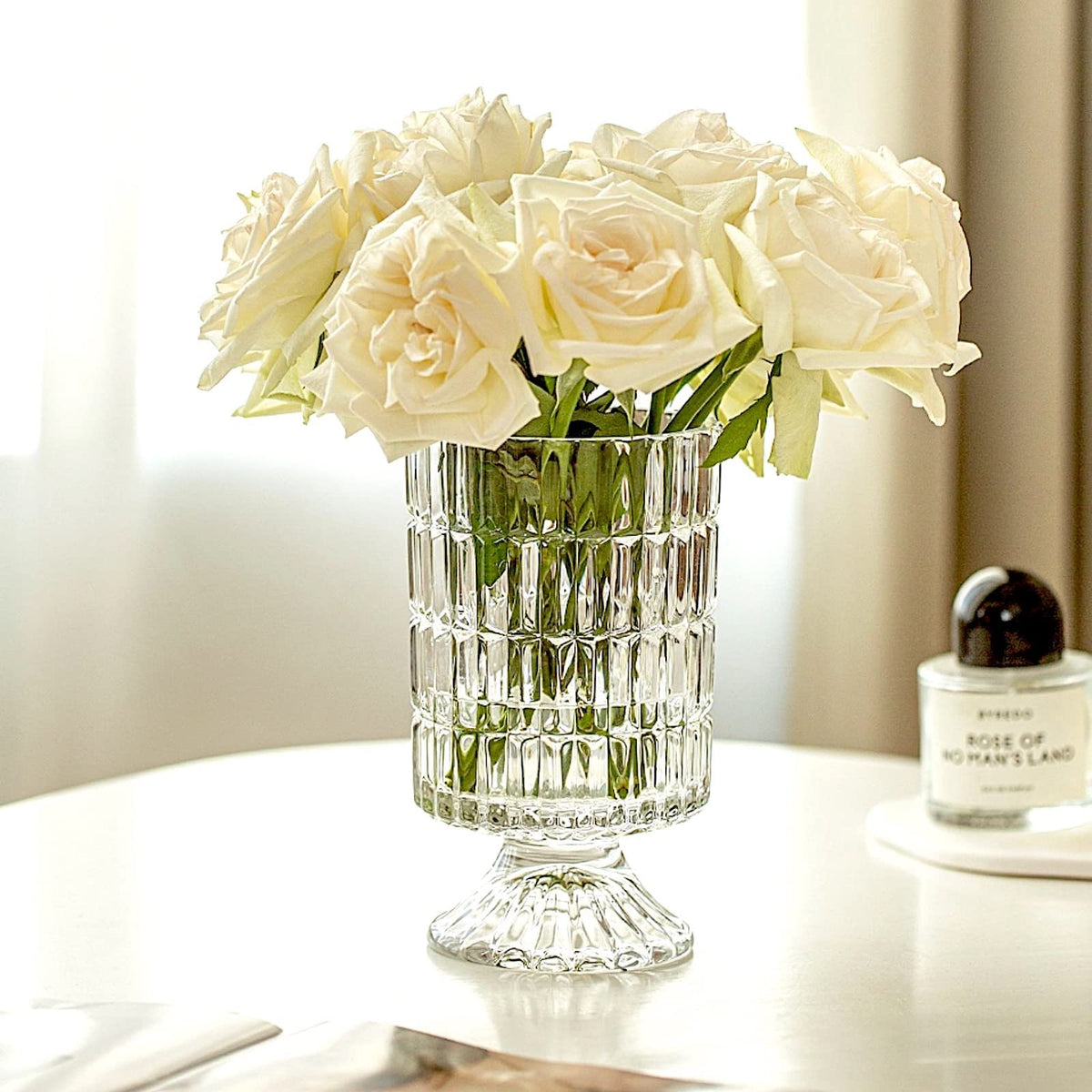 BLOFLO STU pedestal base glass vase ideal for centerpieces and display.