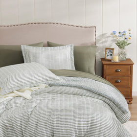 BLOOMHAVEN floral reverse detail showcases dual-look bedding option.