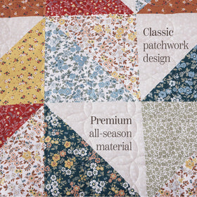 BLOOMHAVEN pillow shams complete the bed ensemble with a polished finish.