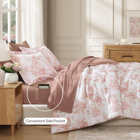 BLOOMHAVEN pink floral comforter detail highlights refined decor.
