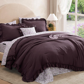 BLOOMHAVEN shams coordinate the ensemble with elegant flounce accents.