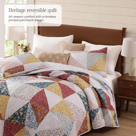 BLOOMHAVEN burnt orange floral quilt brings warmth and color to any season.