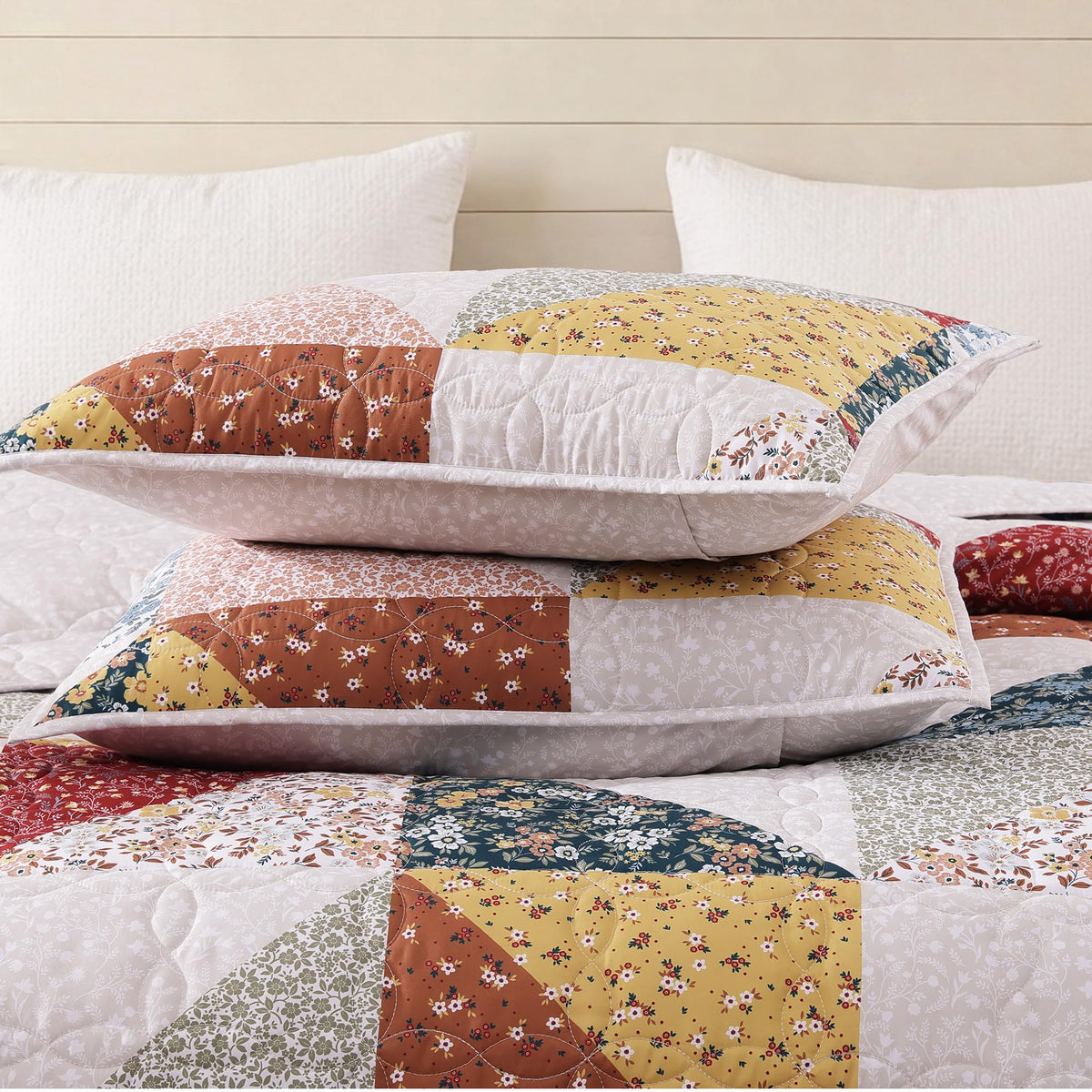 BLOOMHAVEN queen 3-piece set includes quilt and two matching shams for coordinated look.