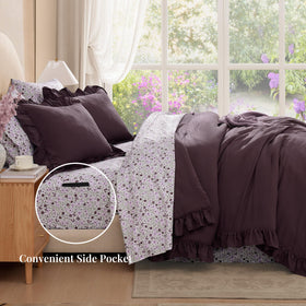 BLOOMHAVEN ruffled comforter detail shows delicate trim for a luxe look.