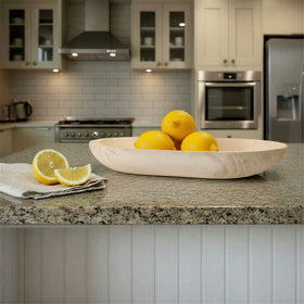 Bloomingville decorative bowl with dried florals for a room accent.
