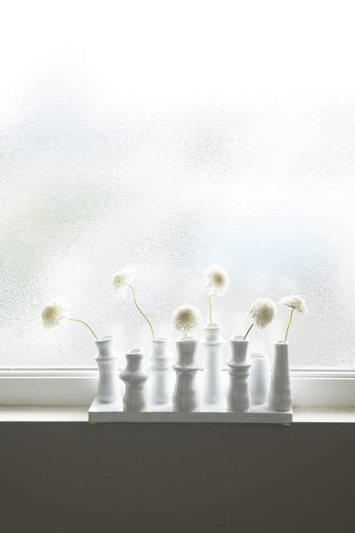 Bloomingville white stoneware centerpiece display with clean lines
