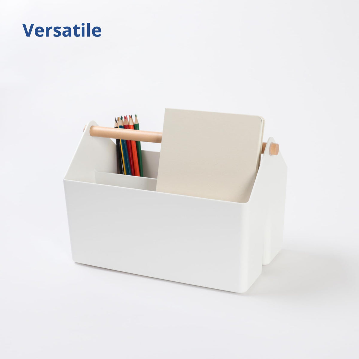 Blue Ginkgo caddy basket with wooden handle for kitchen organization.