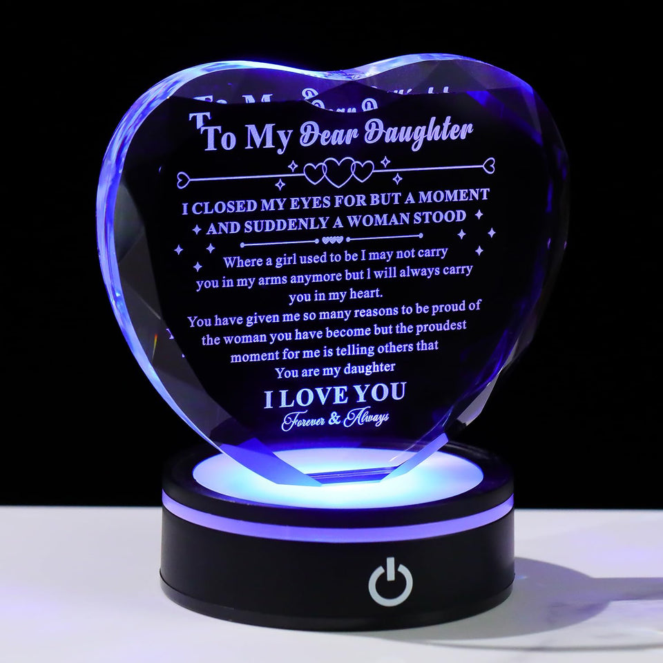 Bluebook heart-shaped crystal plaque glows softly for a keepsake.