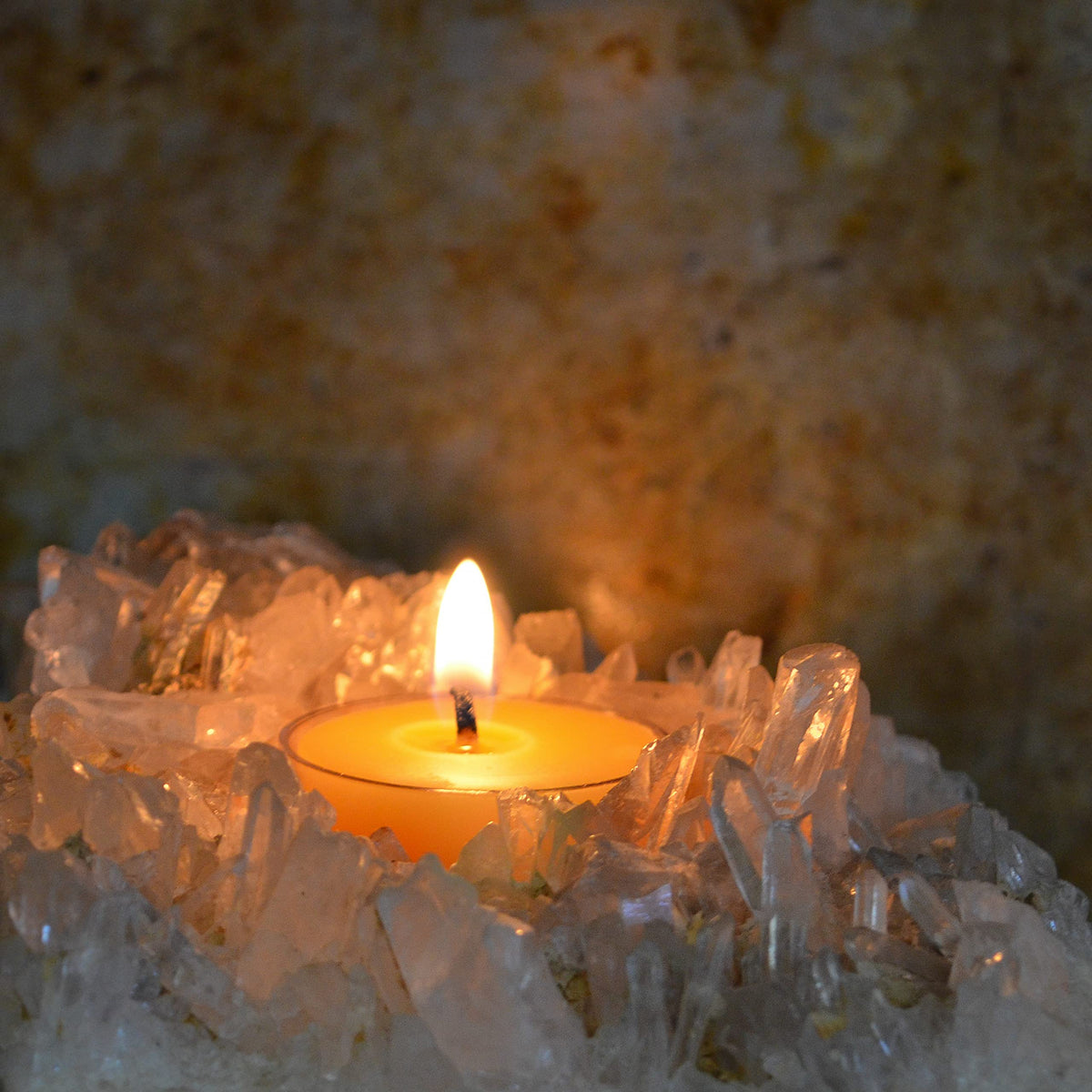 Bluecorn beeswax tea light on dining table creates inviting evenings.