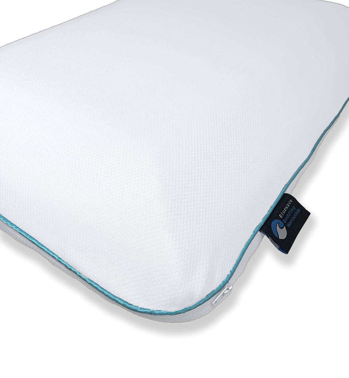 Bluewave pillow in bed with sheets illustrating nightly comfort and alignment