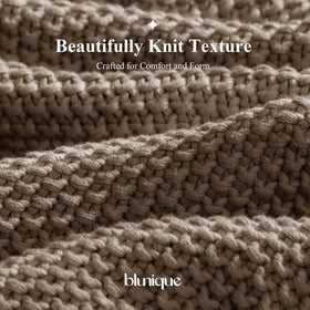 Beige cotton knit layer by the bed adds subtle warmth.