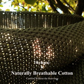 blunique Versatile knit blanket suited as a thoughtful housewarming gift.