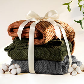 blunique Olive Green throw ready for all-season layering on couch.
