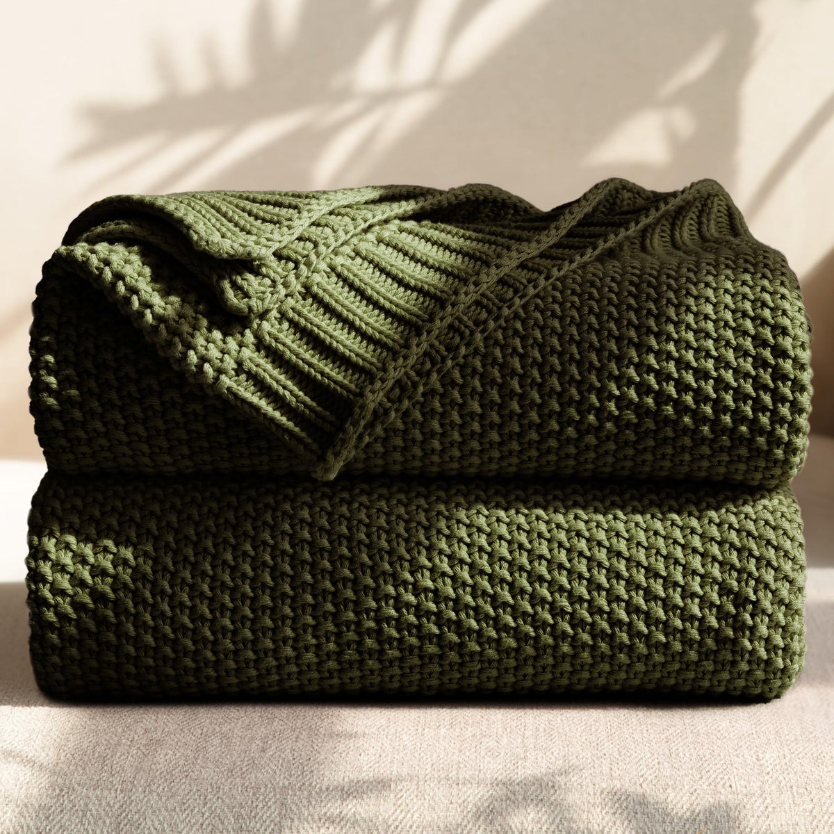 blunique Olive Green cable knit throw on sofa adds cozy warmth and texture.