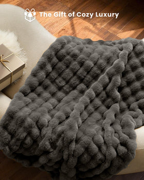 Generous 50x60 inch Blunique blanket fits couches and beds