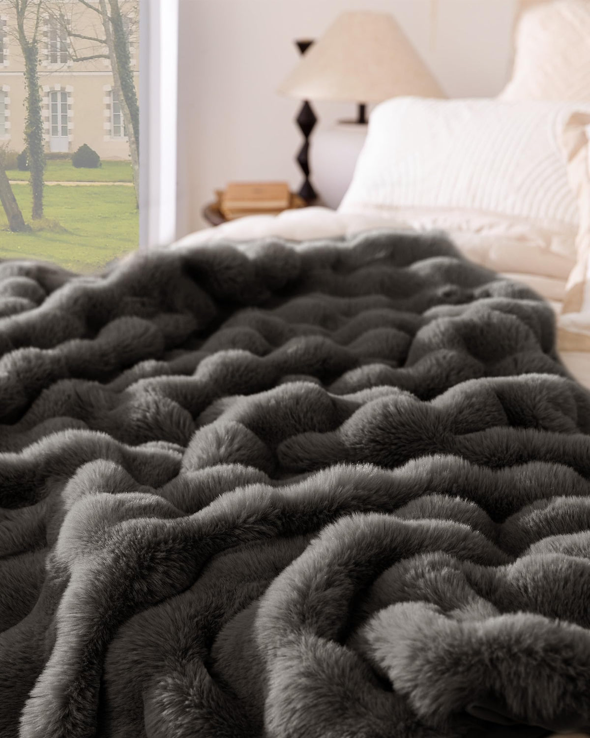 Decorative Blunique blanket draped over a chair enhances living space