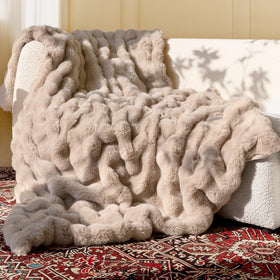 Blunique Ultra Soft Faux Fur Throw with bubble design adds luxurious warmth to your couch.