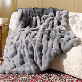 Blunique Ultra Soft Cozy Faux Fur Throw Blanket in light grey showing plush surface for couch warmth