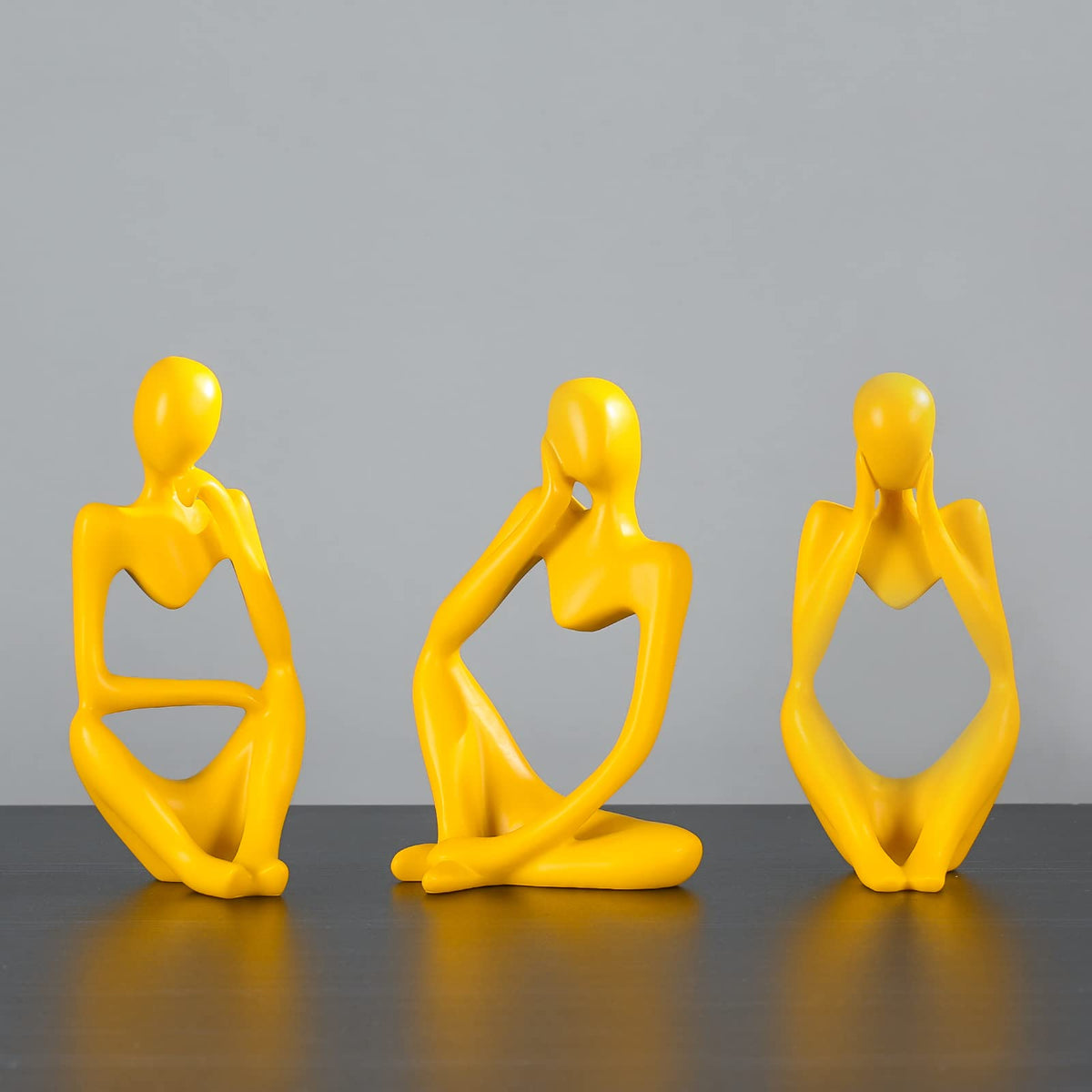 Abstract art sculpture in yellow resin elevates living room ambiance.