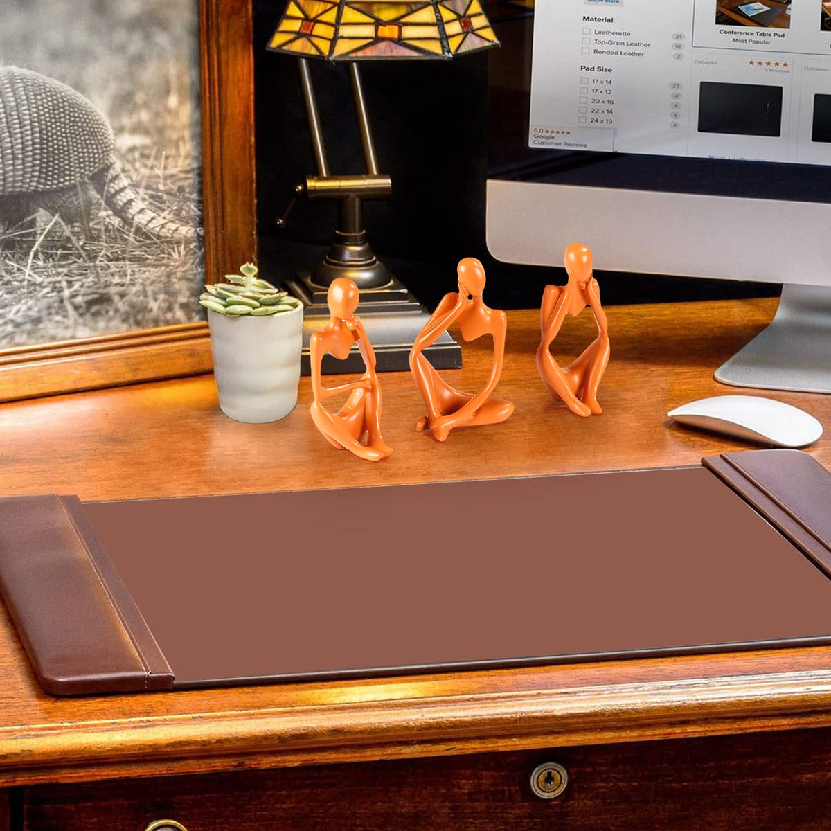 BMLCGJ orange-toned sculpture brightens bedroom and entryway shelves.