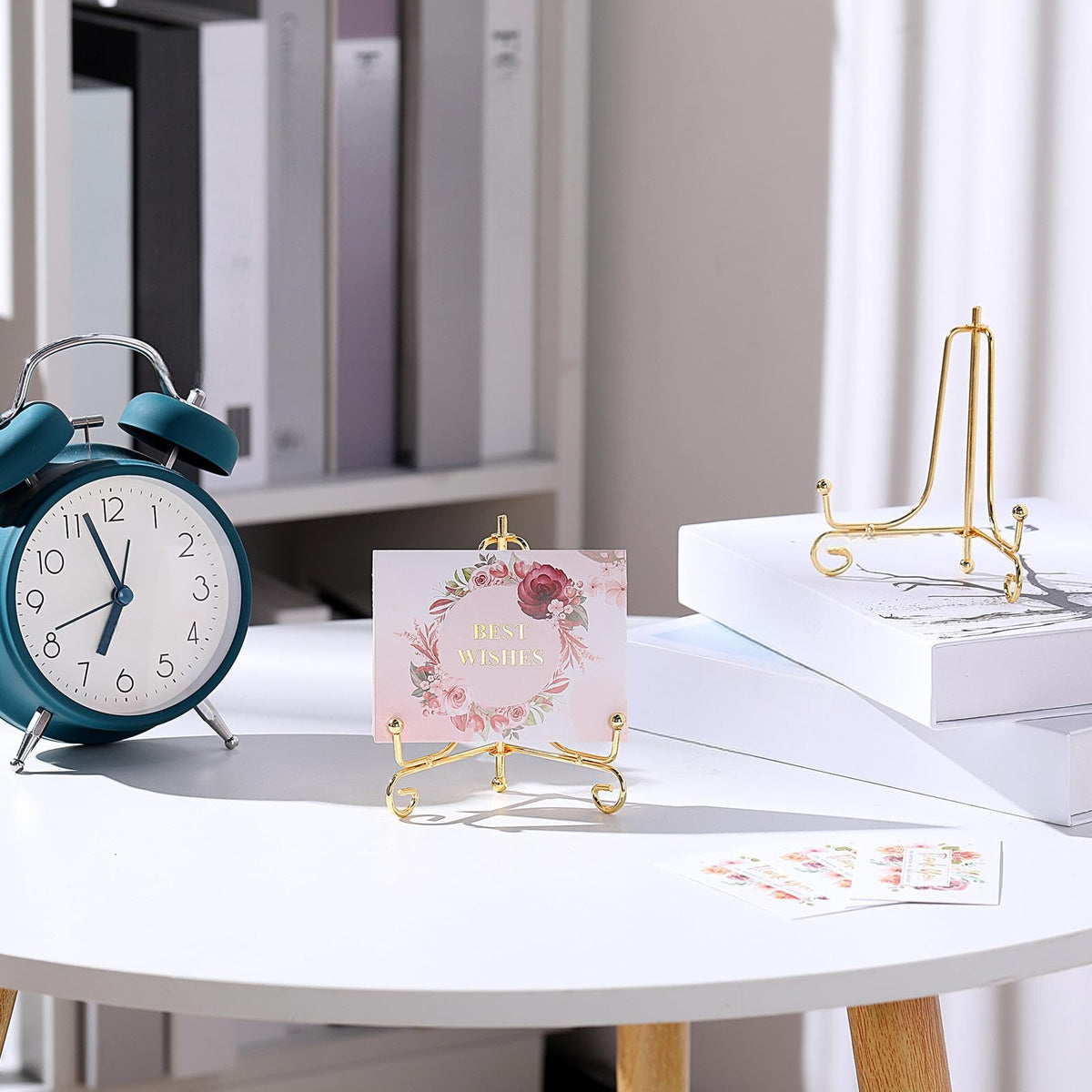 Boao gold plate-holder stand elevates a small artwork with balanced support