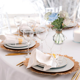 Bokon clear bud vases showcasing blooms with light glow