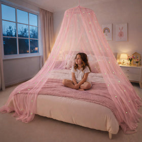 Bollepo pink bed canopy with glowing stars for a magical princess ambiance.