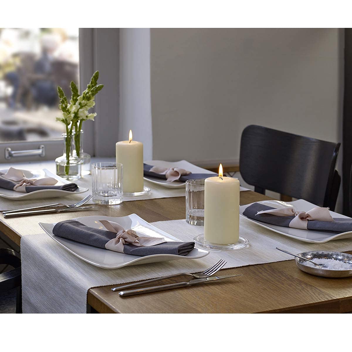 Bolsius Ivory Pillar Candle 2x3 dinner-table setting with warm glow