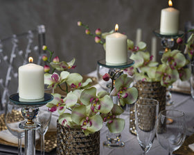 Cotton-wick Bolsius Ivory pillar candle close-up showing dripless burn design.