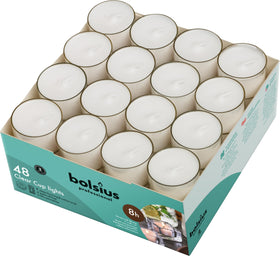Bolsius unscented tea lights in clear cups create a warm, romantic dinner ambiance.