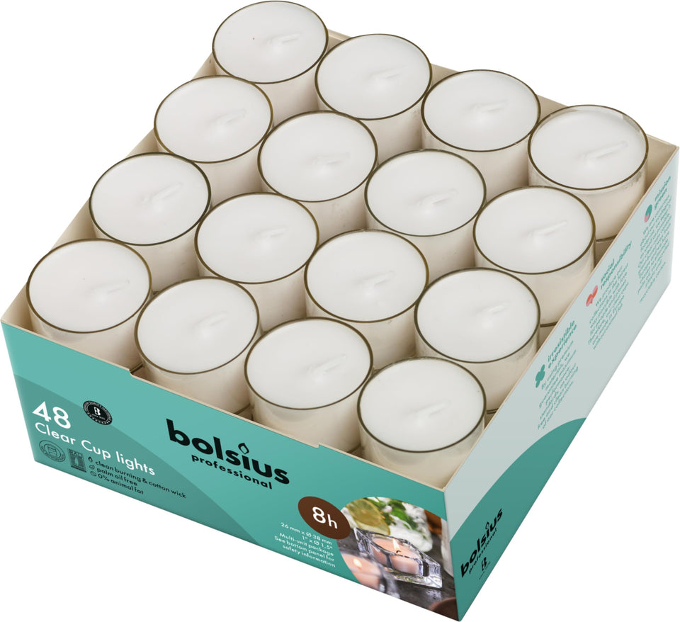 Bolsius unscented tea lights in clear cups create a warm, romantic dinner ambiance.