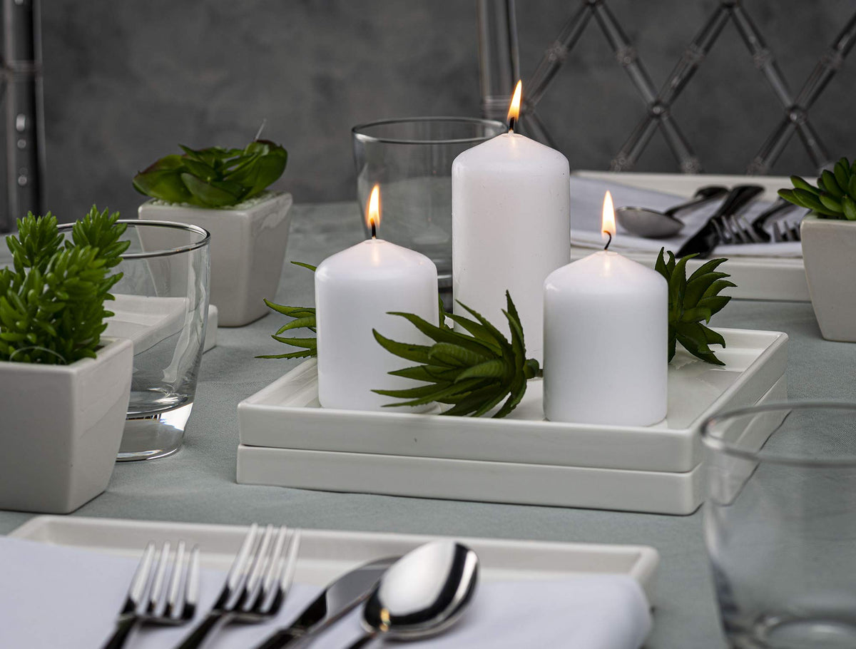 Bolsius white pillar candle 2x3 wick detail highlighting clean burn.