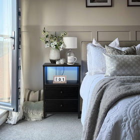 BOLUO nightstand top surface supports up to 35 lbs for lamps or decor.