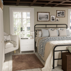 Adjustable feet protect floors and stabilize the BOLUO nightstand.