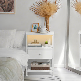 BOLUO nightstand with two USB ports and two outlets for easy charging.
