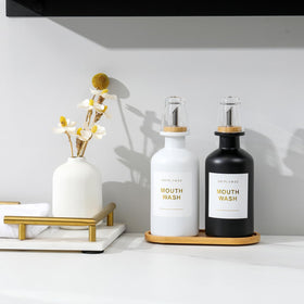 Bonlong glass containers with lids seal mouthwash after use.
