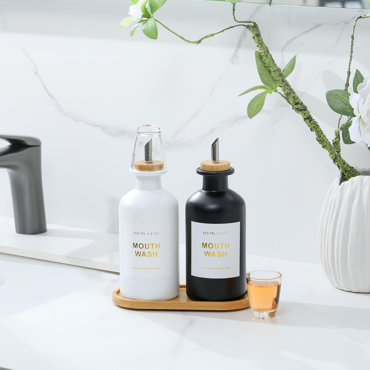 Bonlong pour spout delivers controlled dispensing with bamboo and metal.