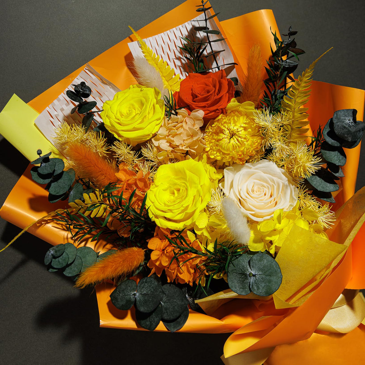 Bonsion preserved flowers arrangement in vase showcases vibrant textures.