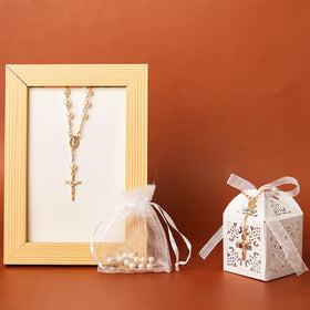 Bonuci folded baptism gift boxes for easy assembly and storage.