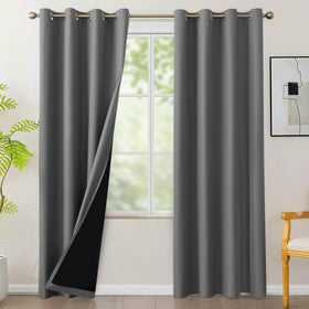 BONZER grey blackout curtain panel blocks light for restful daytime use.