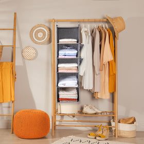 Compact hanging unit increases vertical closet space without bulk.